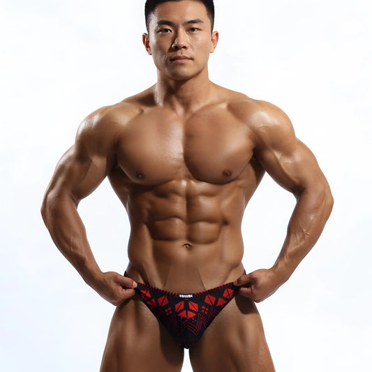 Black and red patterned athletic briefs with geometric design from metro male wear spade thong 2302-74