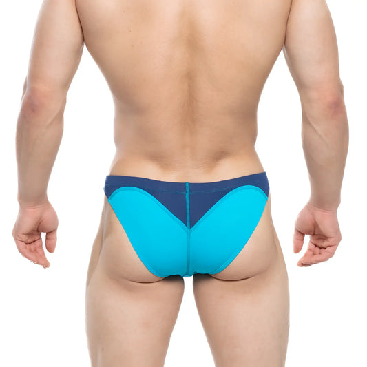 Bright turquoise and navy blue MetroMaleWear Splash Swim Bikini with sleek form-fitting design for athletic use