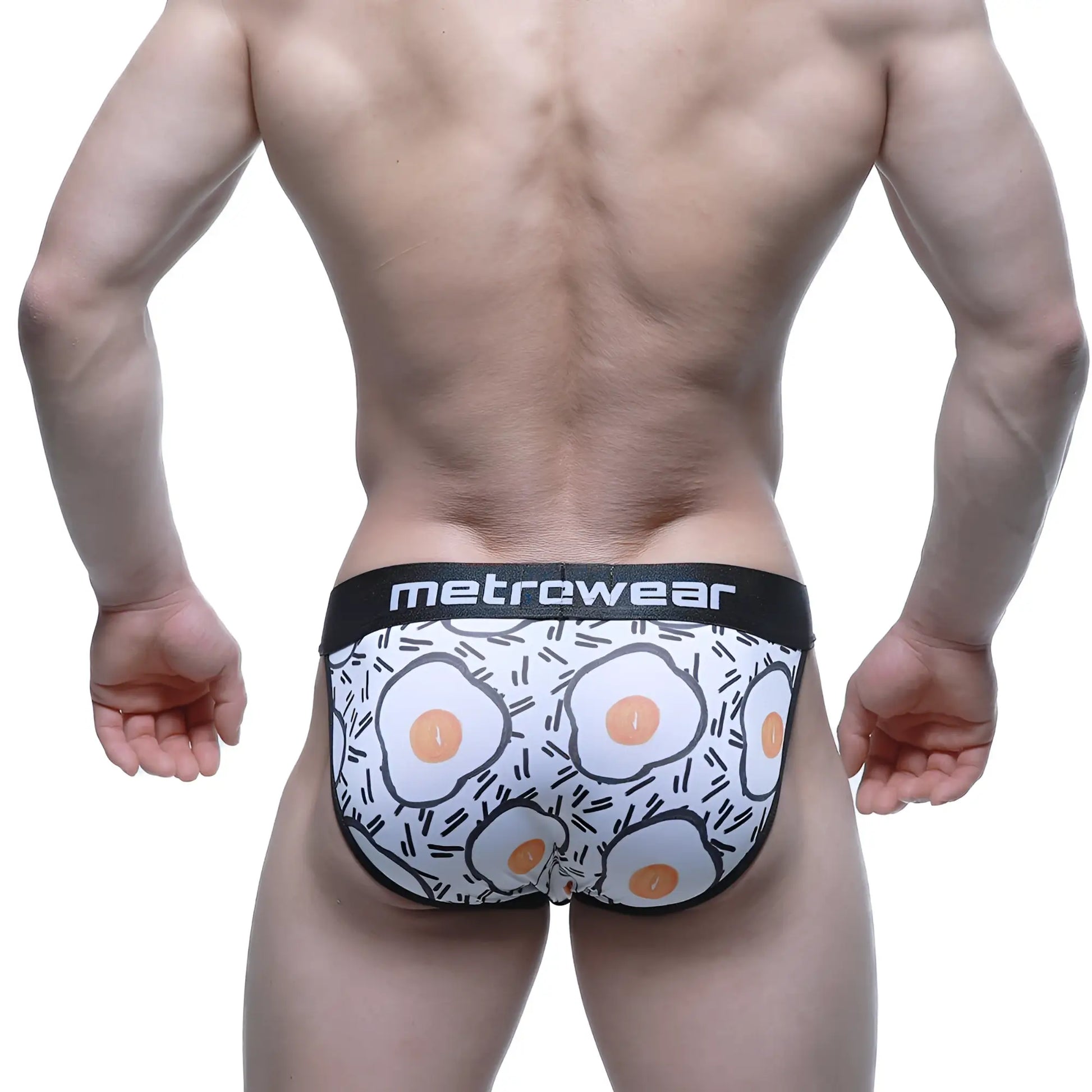 White men’s briefs with fried egg pattern and black trim featuring metrcwear brand on waistband metroMaleWear Sunny Side Bikini 3004-55