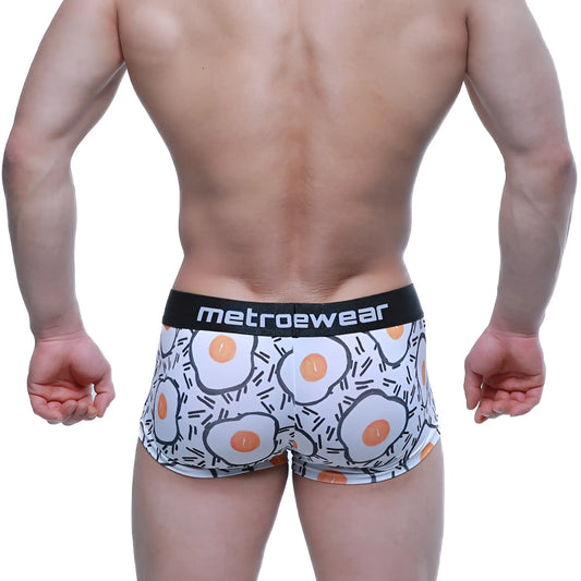 White boxer briefs with a cartoon fried egg pattern and a black logo waistband, MetroMaleWear Sunny Side Short Boxer.
