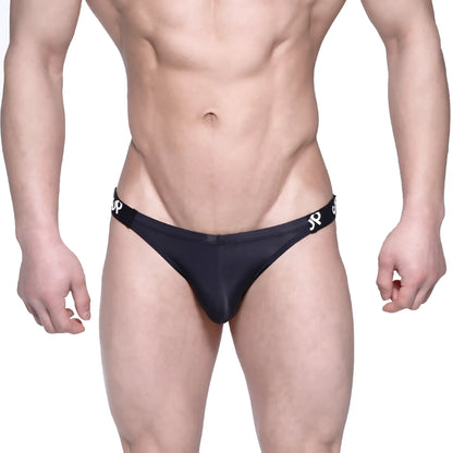 Black sleek form-fitting metro malewear sup bikini briefs with subtle white logo on waistband