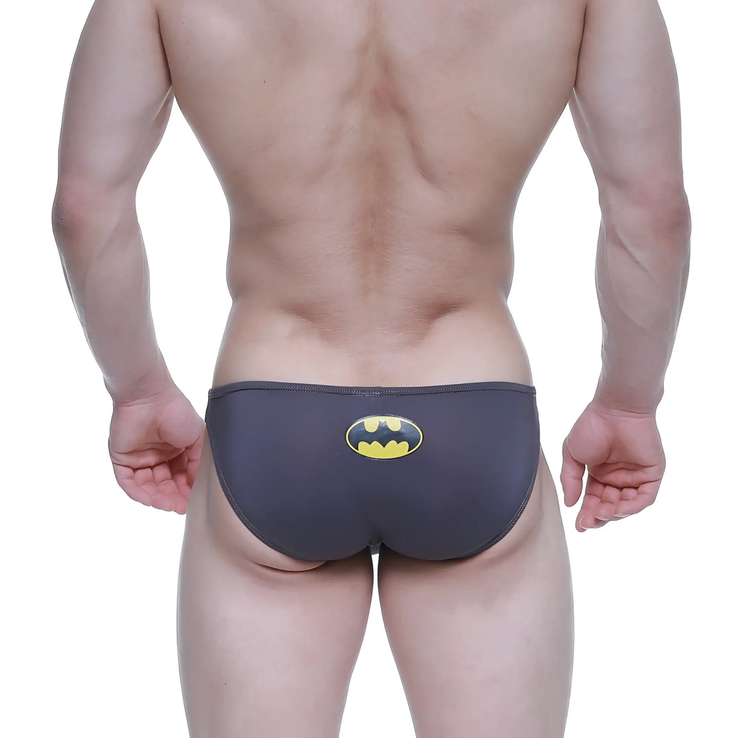 Dark gray metroMalewear super lowrise bikini swim trunks with yellow and black batman logo on the back