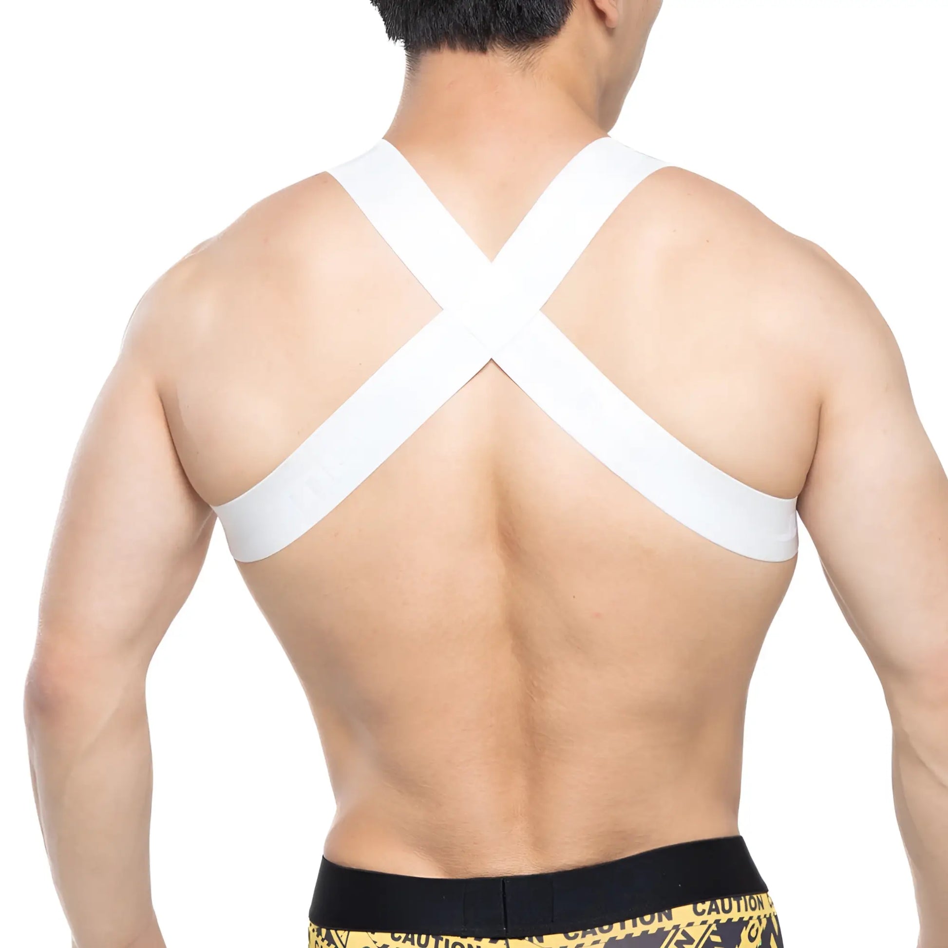 Back view of metromalewear white cross-back support strap harness tank top for shoulder support and style