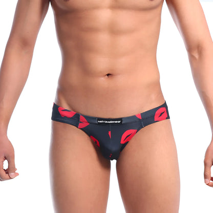 Black briefs with bold red lipstick print and metromalewear label from metro male wear vasco hip brief kiss black 5103-67