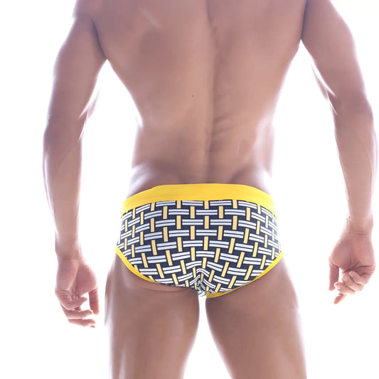 MetroMalewear yellow colander swim brief with a yellow and black patterned woven design swim trunks style