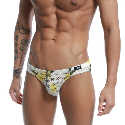 White and yellow patterned mesh swim trunks with black logo tag by metromalewear mango bikini 5103-36