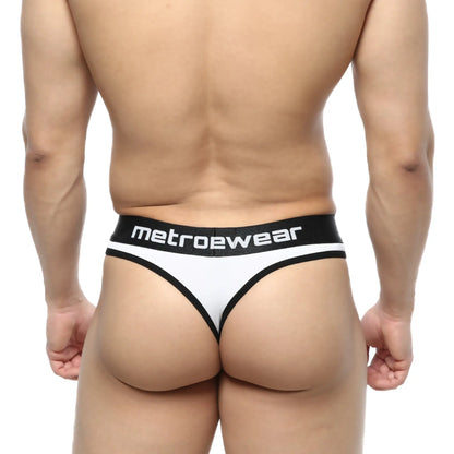 White and black metro malewear martini thong with sleek minimalist design and bold white logo on elastic waistband