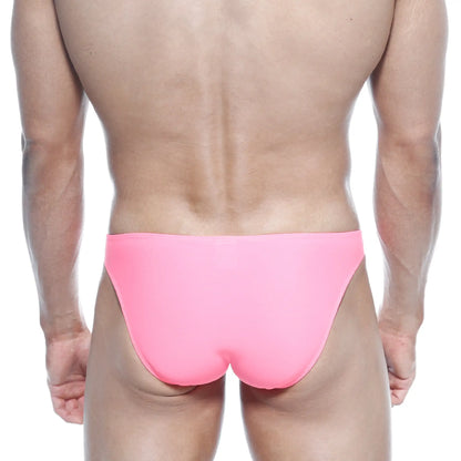 Bright pink sleek form-fitting swim trunks by MetroMaleWear designed for enhancing max bulge look in fuchsia color