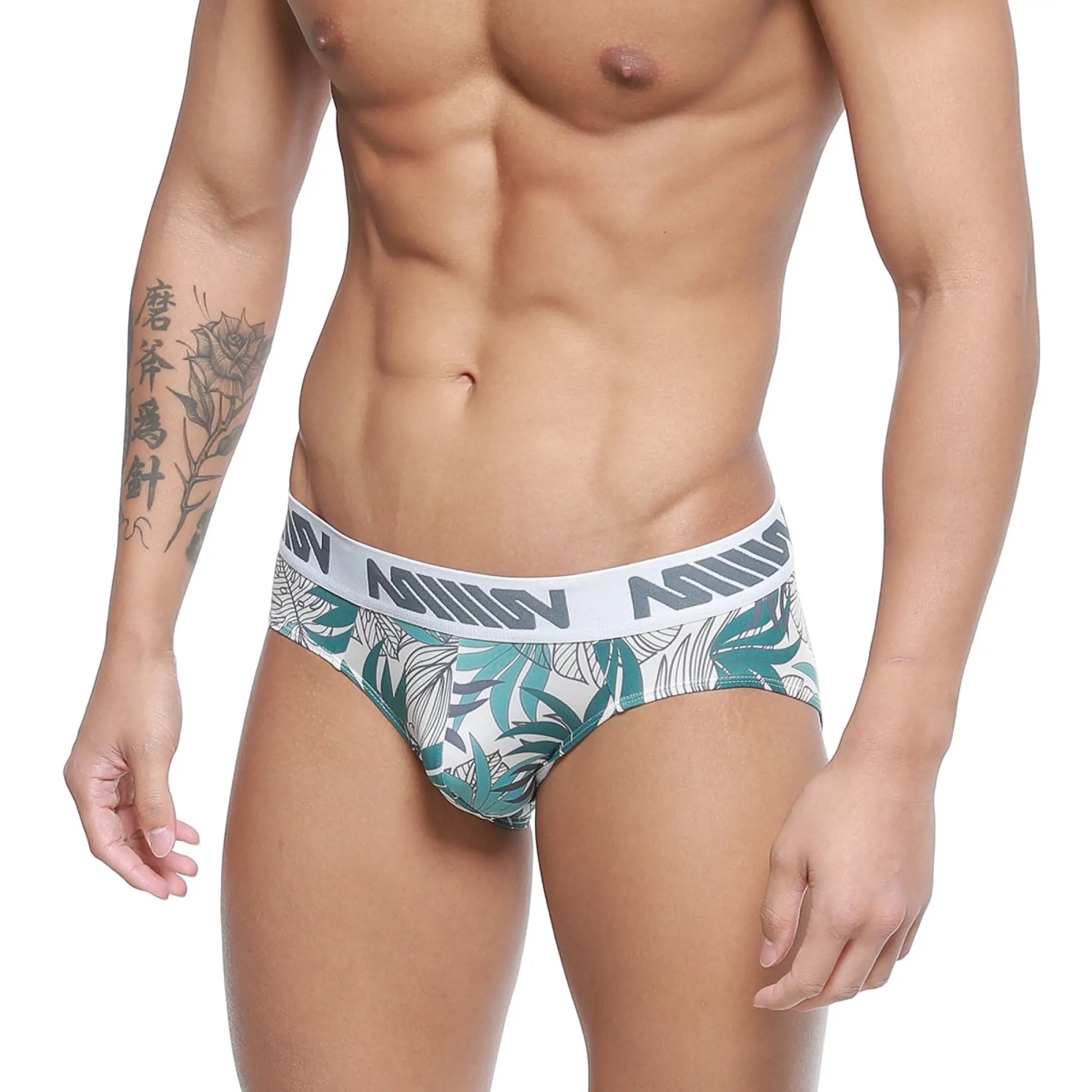 White briefs with green and gray tropical leaf pattern and anis waistband from metromalewear meadow hip brief 5003-56