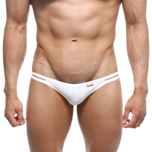 MetroMaleWear Medio Thong white with thin dual straps and small red logo on the front in lightweight material