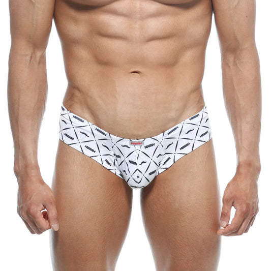 White men’s swim trunks with bold black geometric pattern and stylized mustache motifs by arrow metro male wear