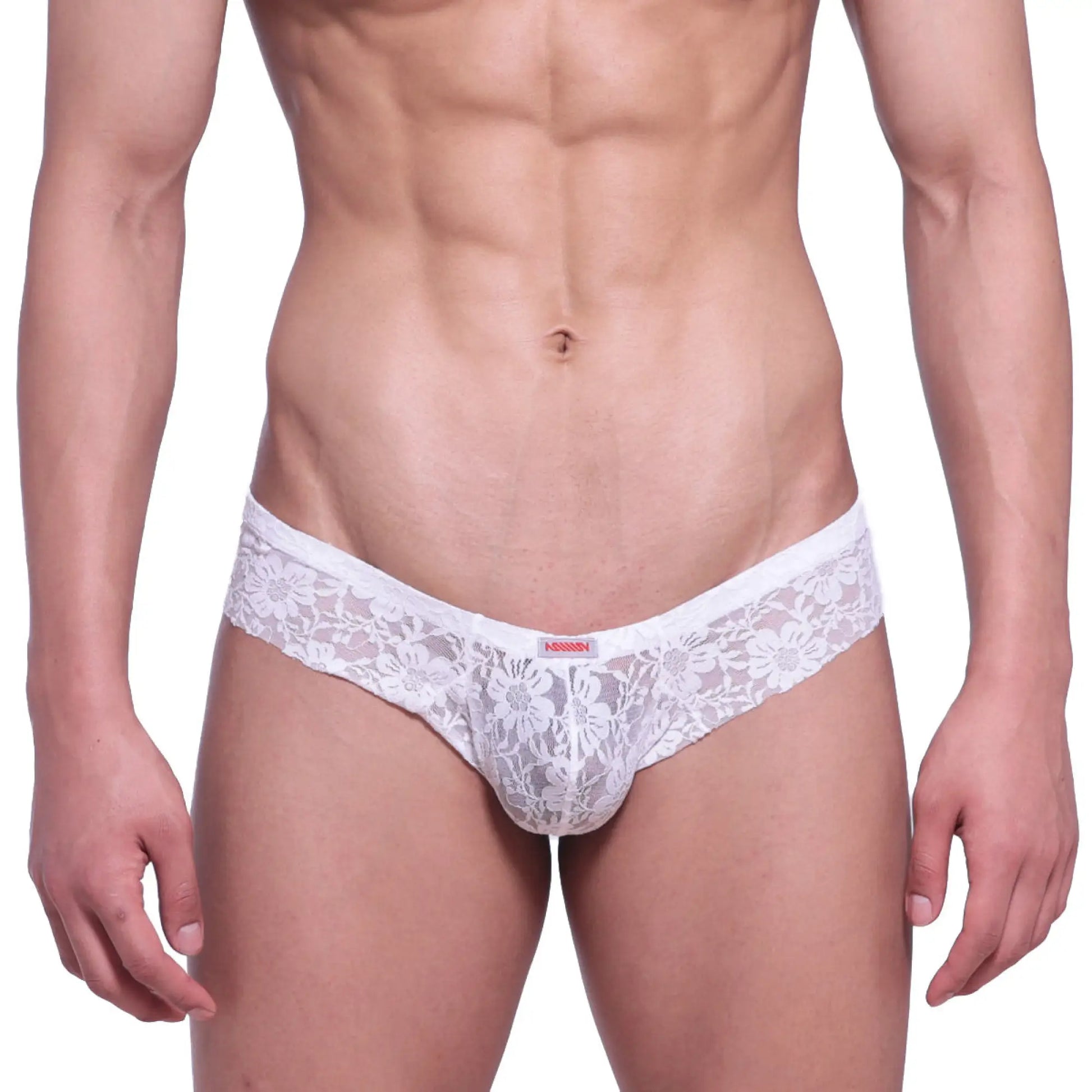 White lace thong with floral pattern and small red brand tag from MetroMaleWear micro cheek lace collection