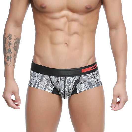 Metro male wear micro mini boxer briefs with black and white cityscape pattern and red logo waistband