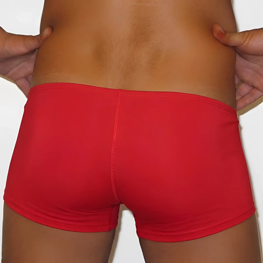 MetroMaleWear minimo boxer red briefs in smooth stretchy fabric shown from the back with a central seam