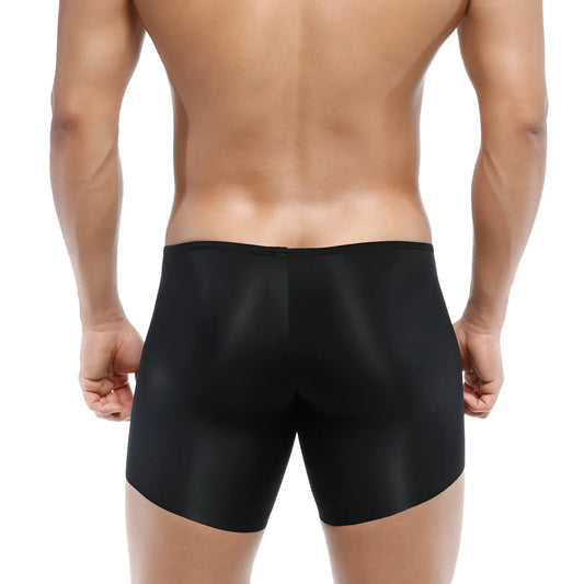 Black sleek satin-finish men’s briefs with a smooth form-fitting design from MetroMaleWear Naked Mid Boxer 2034-30