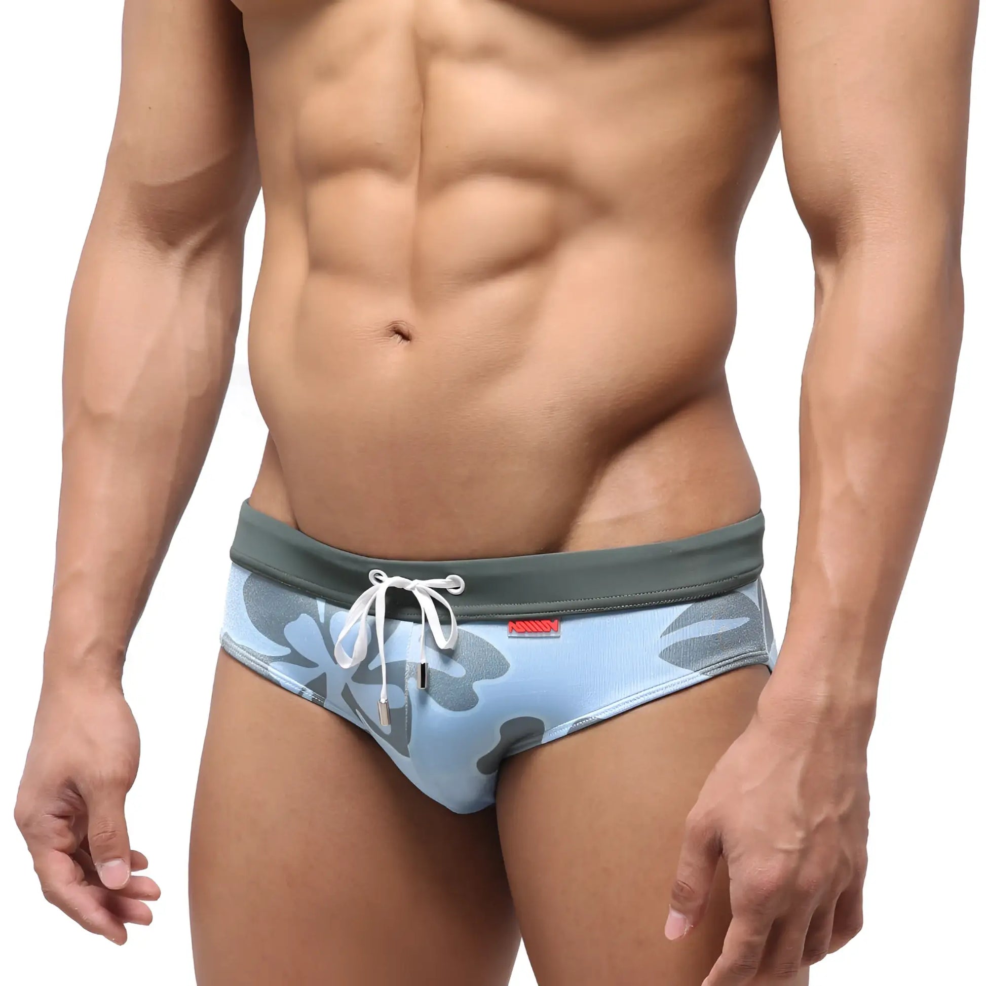 Light blue swim briefs with a gray camouflage pattern and white drawstring waistband.