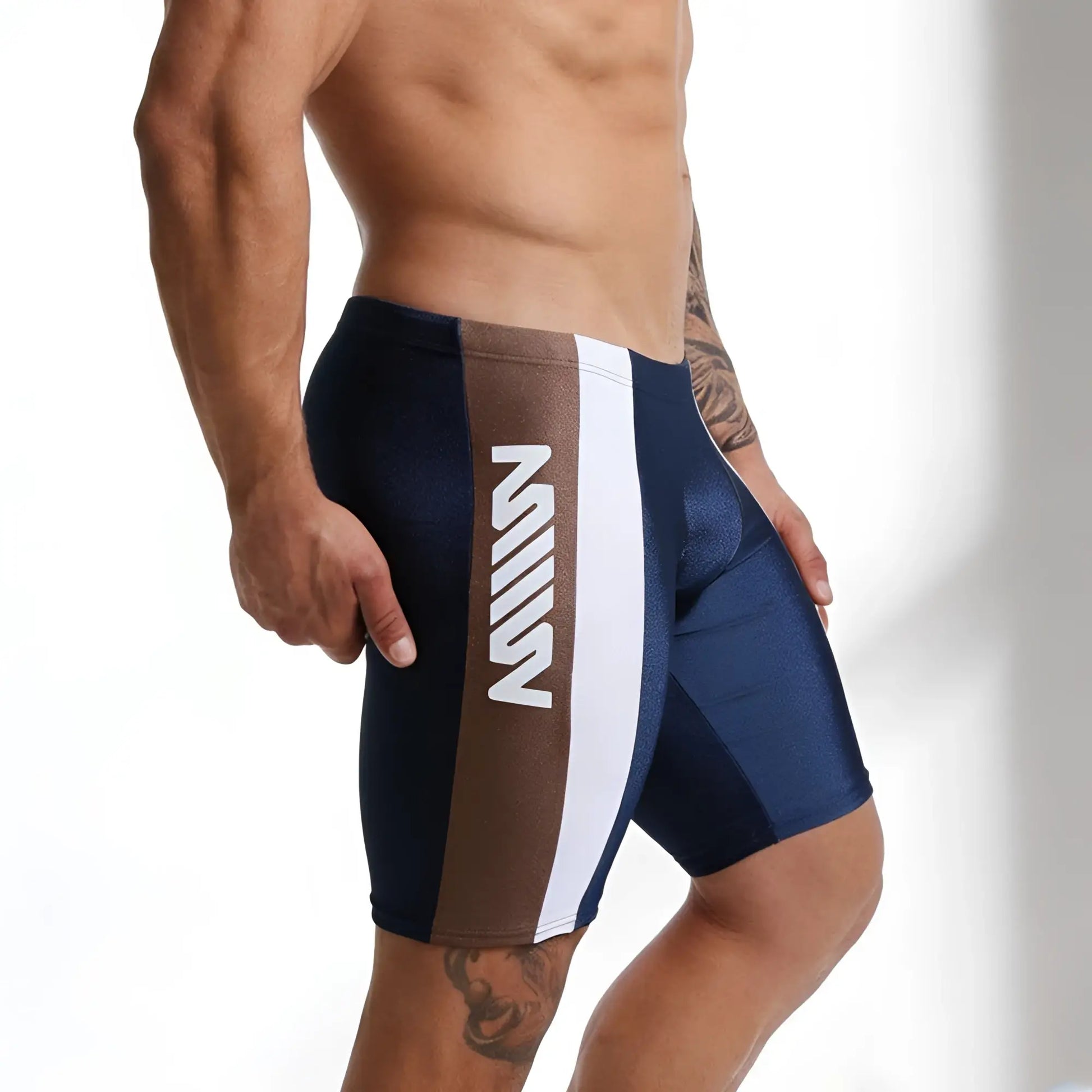 Navy blue and brown jammer swim boxer by metromalewear with white vertical stripe and bold m logo