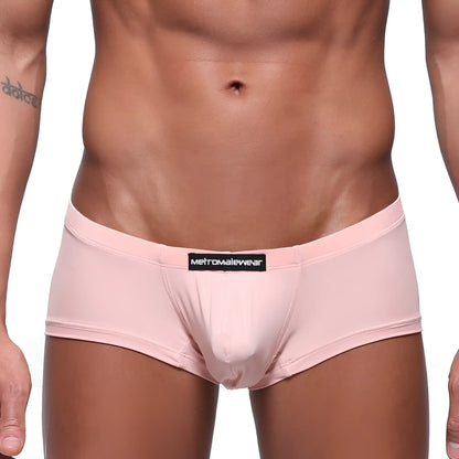 Pink mens briefs from metromalewear with a black logo label on the waistband in dusty pink color