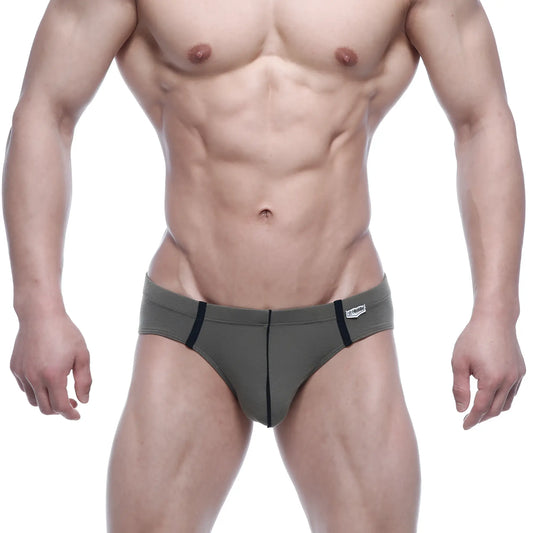 Olive green MetroMaleWear Oslo hip brief with black trim and white brand tag on waistband designed for athletic use