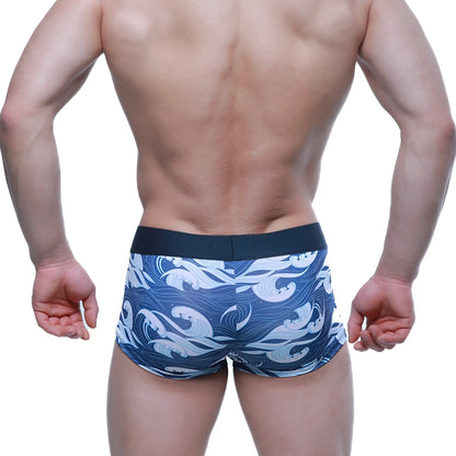 Blue and white wave patterned metroMalewear pado short boxer briefs with black elastic waistband for men