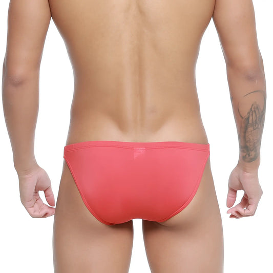 A sleek coral-red form-fitting swim trunk from MetroMaleWear Paleta Bikini 3604-13 designed for swimwear use