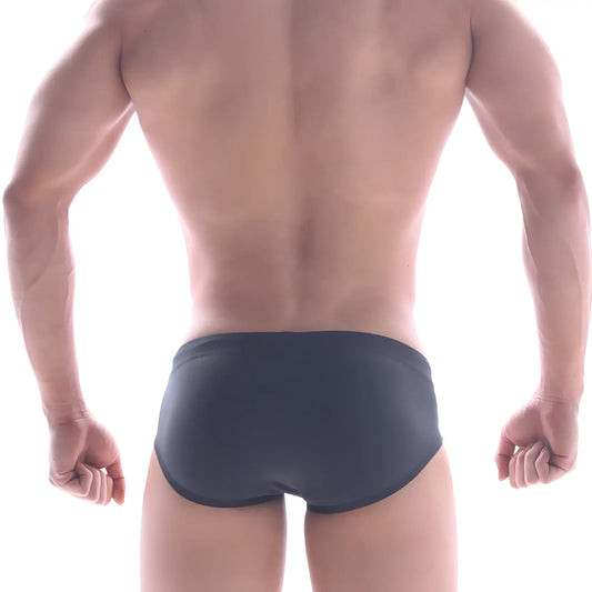 Dark gray form-fitting MetroMaleWear panel swim brief made of smooth stretchy fabric for comfortable swimwear use