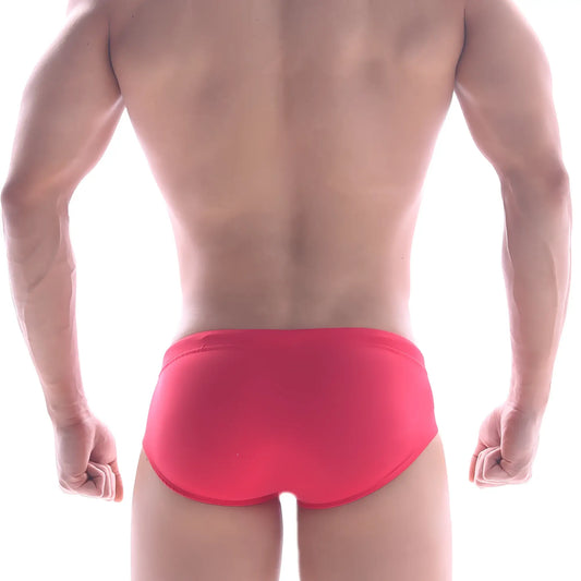 Bright red metroMaleWear panel swim brief with a smooth form-fitting design perfect for swimming and beachwear