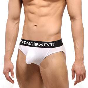White men's briefs with a black waistband featuring the Metromalewear logo.