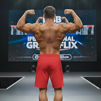 A muscular man shows the back side of metrohalewear physique board short crimson 4706-13 in bright red athletic shorts