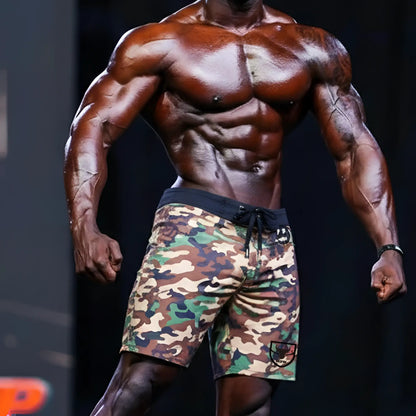Metro malewear physique board short green camo with black drawstring waistband and logo patch on lower right leg