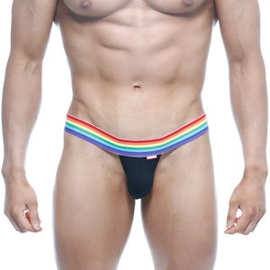 Black MetroMaleWear Pride thong featuring a rainbow-striped waistband showing the front side design