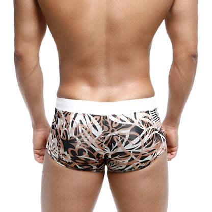 MetroMaleWear Profundo swim boxer briefs feature black beige and white abstract leaf pattern with solid white waistband