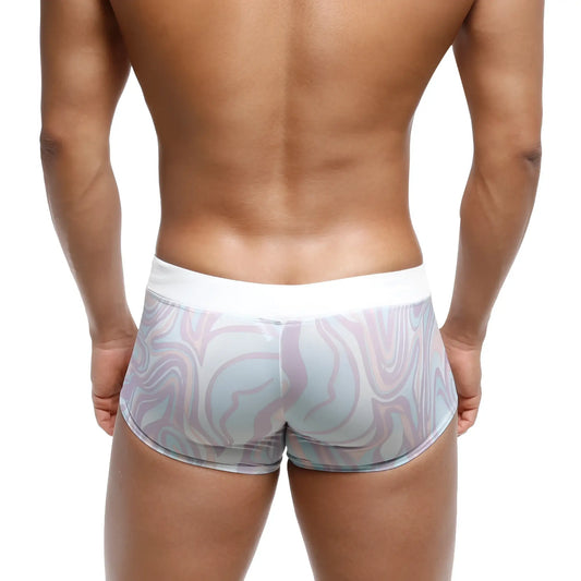 White waistband swim boxer briefs with pastel lavender and light blue swirl pattern from metromalewear profundo line