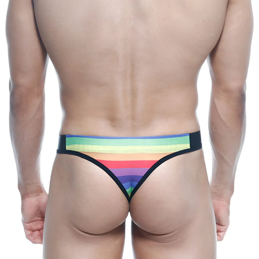 MetroMaleWear rainbow thong 2502-04 with rainbow stripes and black trim, showcasing the front side