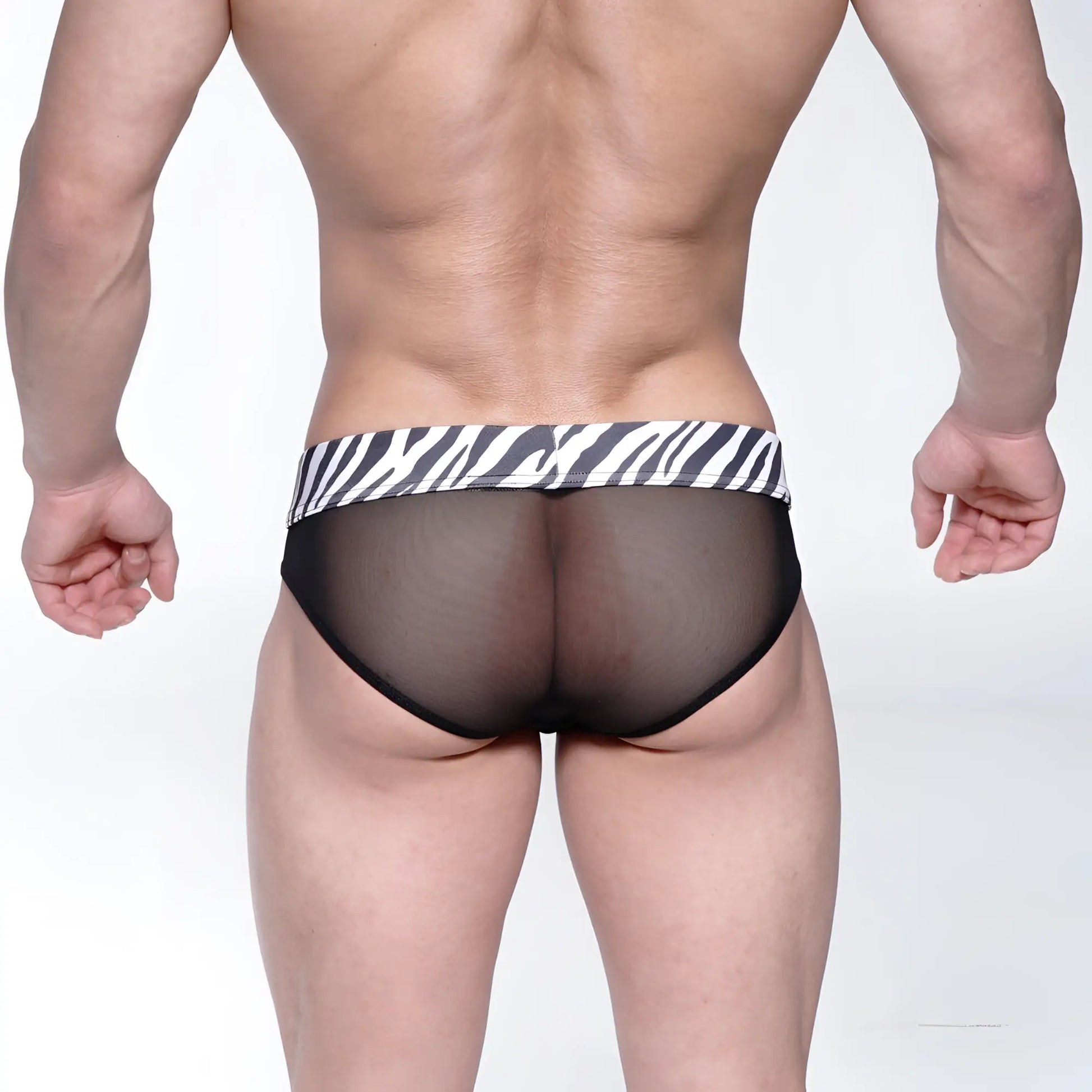 Black mesh briefs with a bold black and white zebra-striped waistband from MetroMaleWear Savage Bikini 6105-50