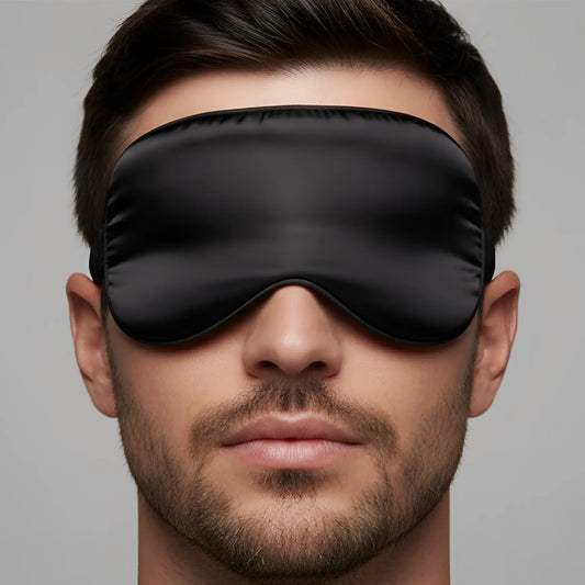 Black satin silk eye mask with smooth glossy finish and elasticized edges by MetroMaleWear for comfortable sleep