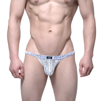 White lace thong with blue patterned waistband and small black logo tag from metromalewear spy glass bikini ivory 3004-82