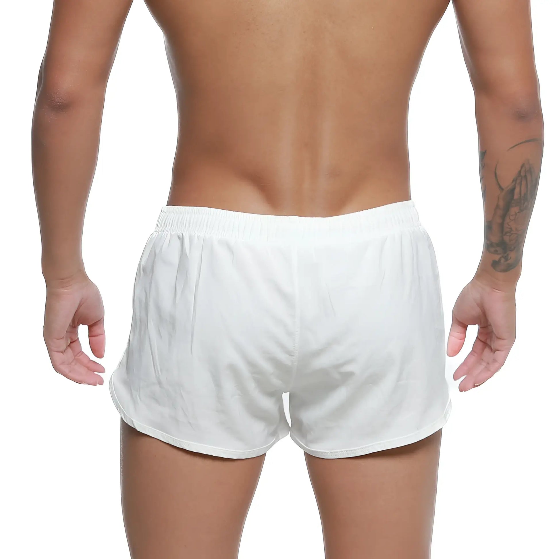 White athletic swim shorts with elastic waistband and relaxed fit by metromalewear for summer use