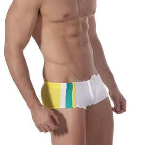 White MetroMaleWear surf swim boxers with bold yellow and teal vertical stripes designed for beachwear