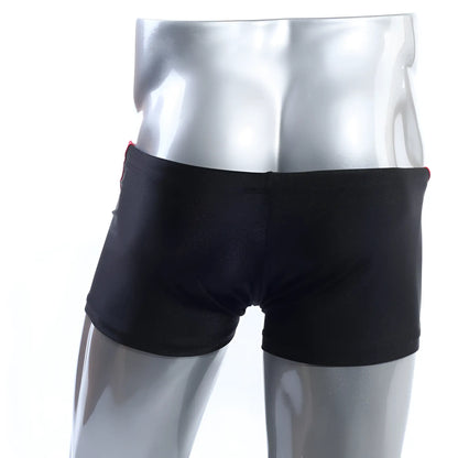 MetroMaleWear Ultra Square Cut black swim trunks with red side seam trim designed for comfortable swimwear use
