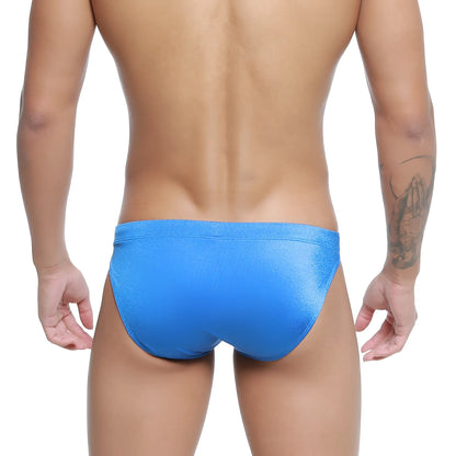 Vibrant blue shimmering fabric briefs with sleek form-fitting design from MetroMaleWear Vanguard Swim Bikini