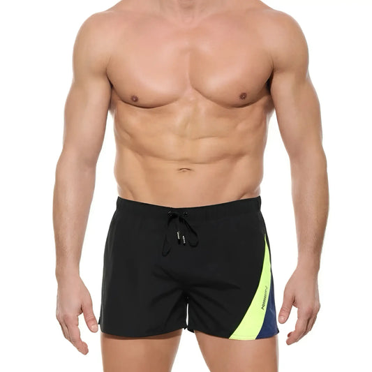 MetroMaleWear Viena short black swim trunks with vibrant neon yellow and navy blue diagonal side stripe
