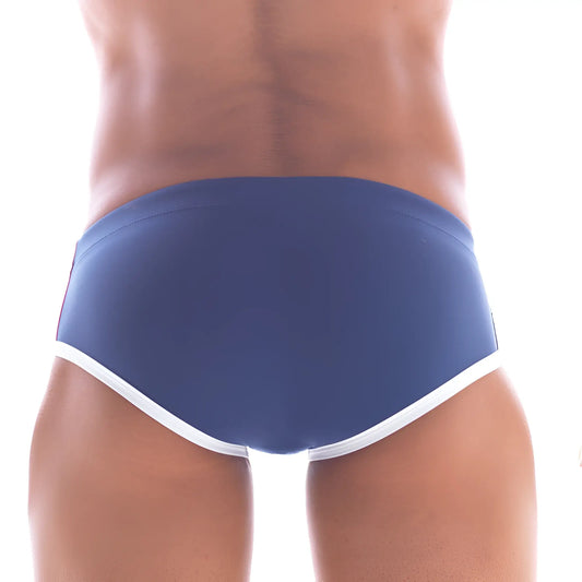 Navy blue metro malewear wave swim brief with white trim made for comfortable swimming and beach use