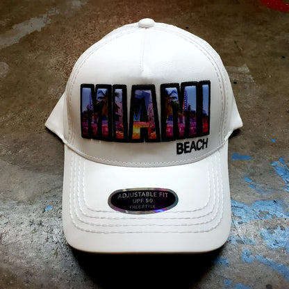 White baseball cap with vibrant colorful miami beach patch and urban skyline design with black trim
