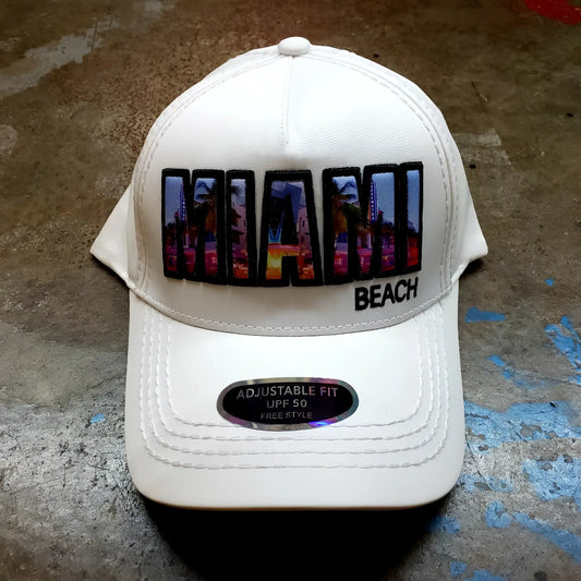 White baseball cap with vibrant colorful miami beach patch and urban skyline design with black trim