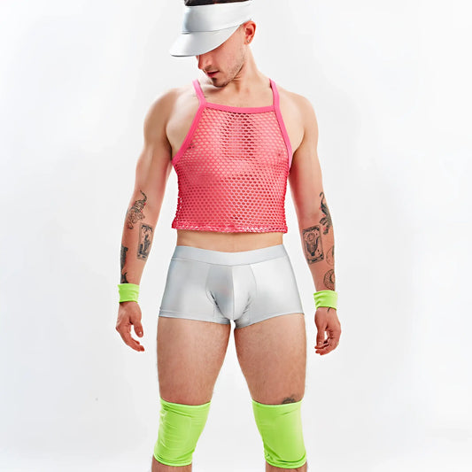 A man wearing a miami jock barbie mesh pink tank top with silver metallic shorts and neon green knee-high socks