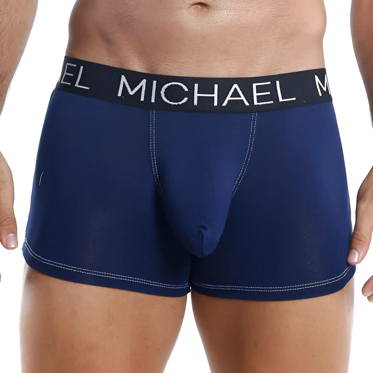 Navy blue michael kors michael mlg001 boxer trunk with white stitching and black waistband with white brand lettering