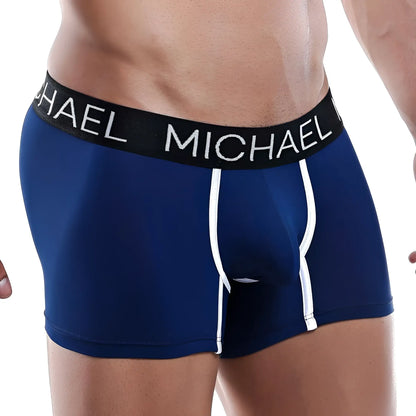 Navy blue michael kors boxer trunk with white side stripes and black waistband featuring bold brand lettering