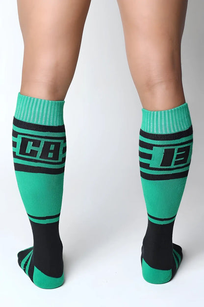 Midfield knee high socks in green and black with bold lettering on the calf designed for athletic use