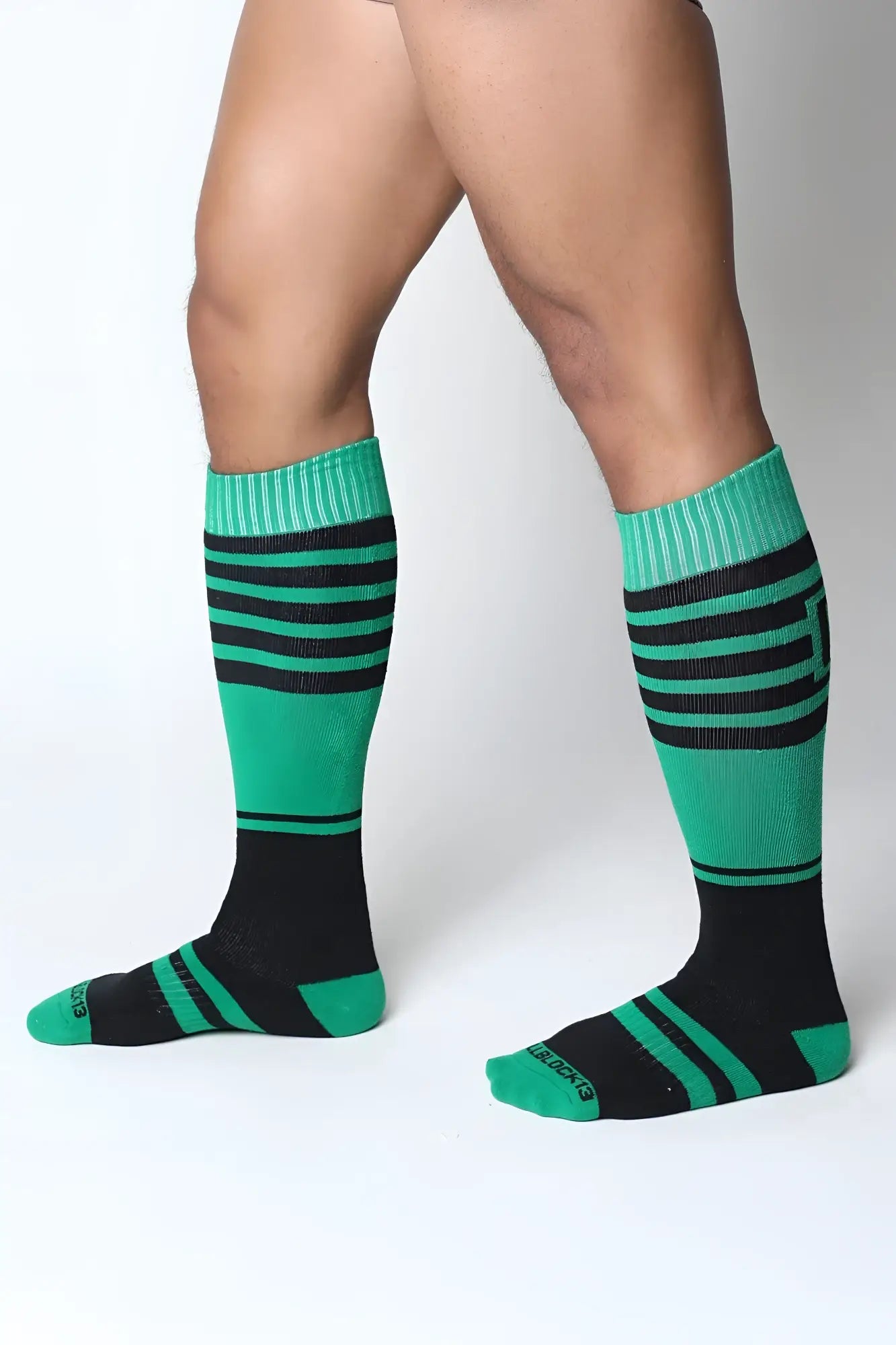 Midfield knee high sock in green and black stripes with ribbed cuffs for comfortable all-day wear